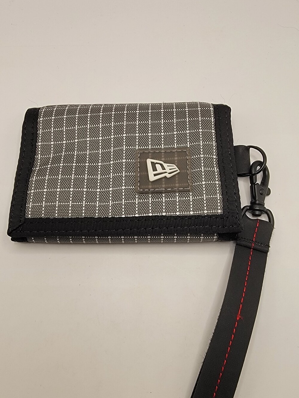 New Era Gray and Black Grid Trifold Wallet with Red-stitched Wrist Strap